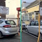 Man bouwt een stellage rondom een auto die zijn inrit blokkeerde